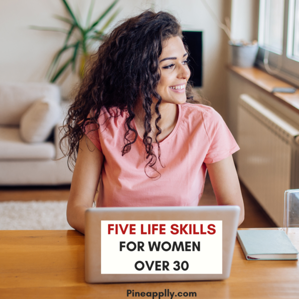 Woman with a laptop looking to her right. with a text overlay that says five life skills for women over 30