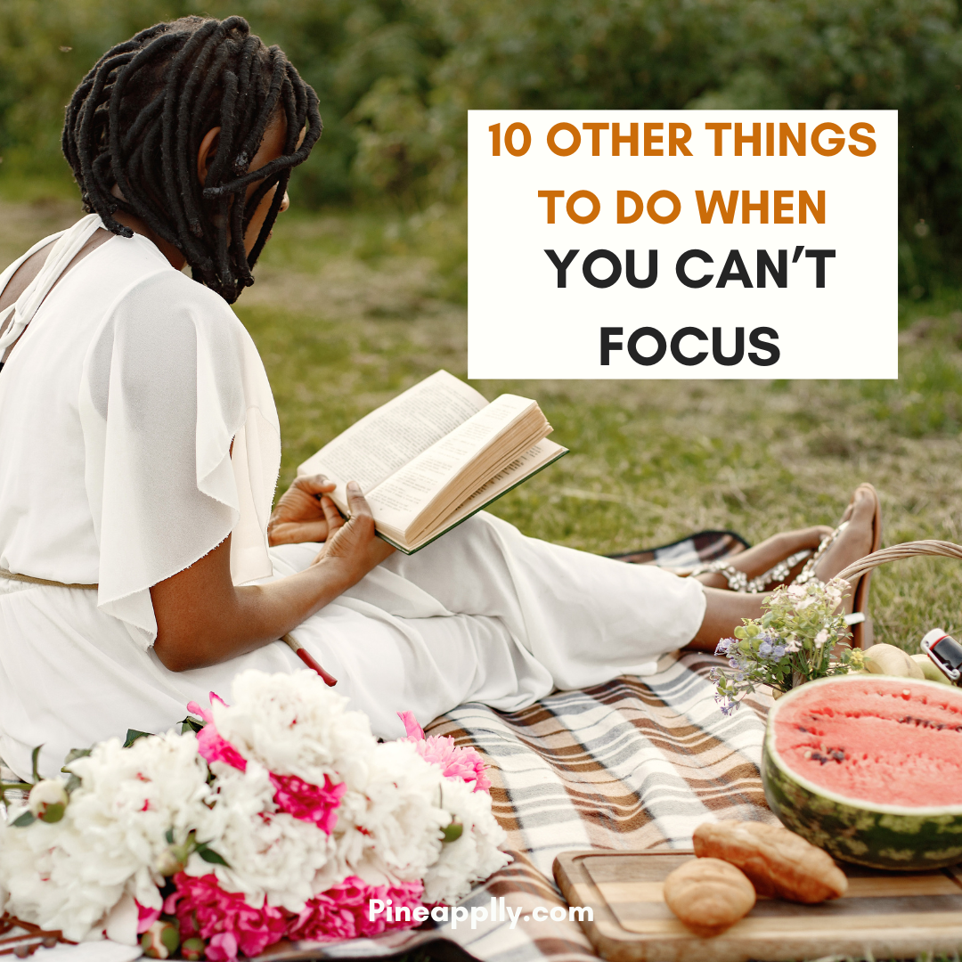 Lady on a picnic blanket reading a book with a text title of 10 others things to do when you can't focus.